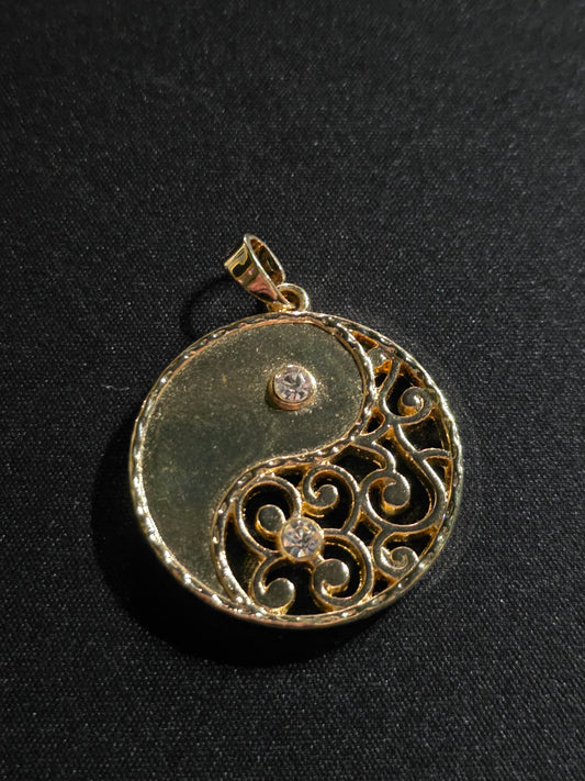 Gold color yin/yang pendant