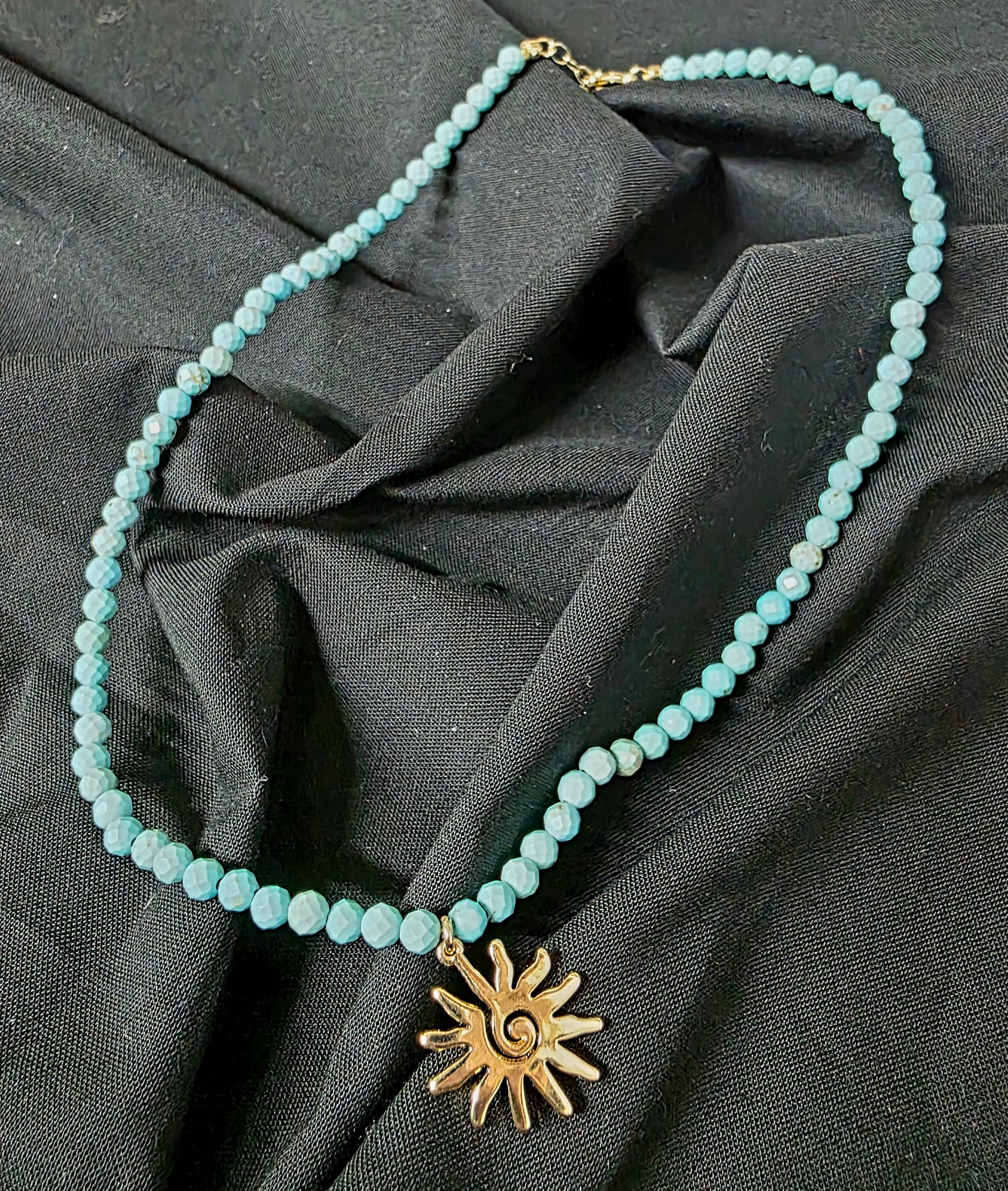 Sun charm necklace with genuine stones