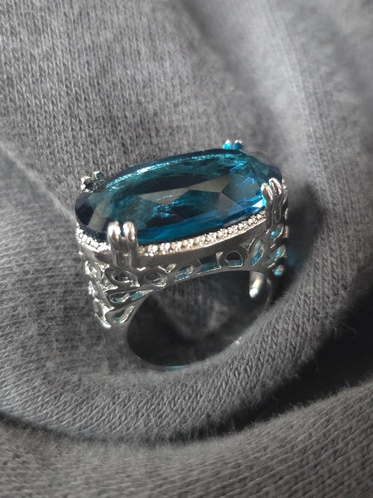 Large blue oval stone silver plated ring