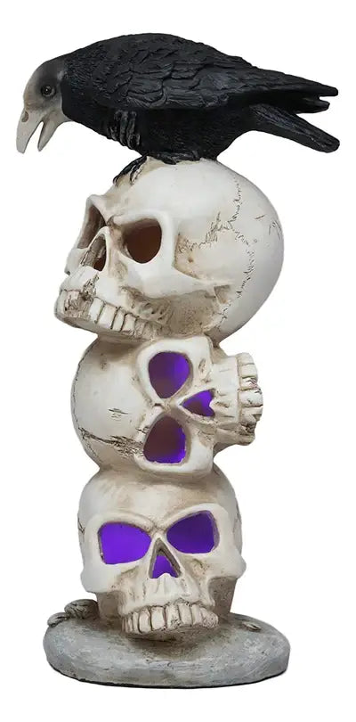 Raven Sitting on LED Skulls Statue