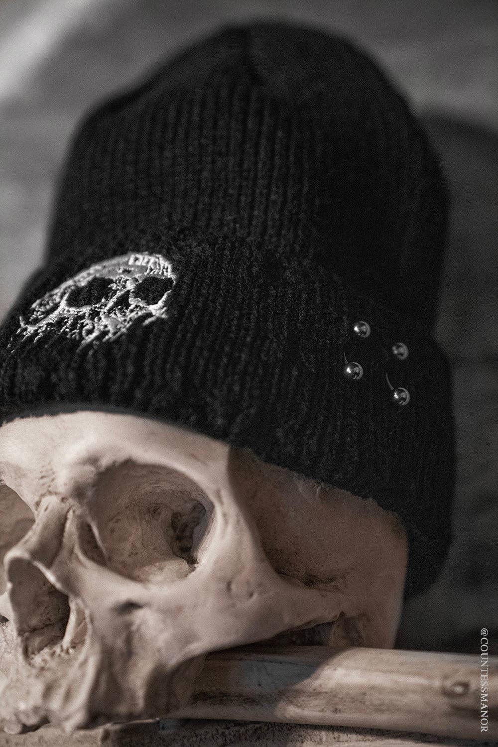 Premium Embroidered Dripping Skull Distressed Pierced Beanie