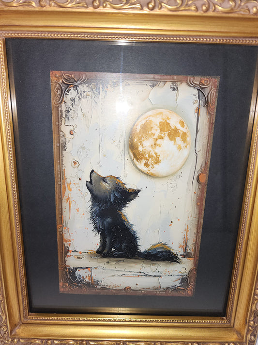Baby Wolf Howling at the Moon Framed Print