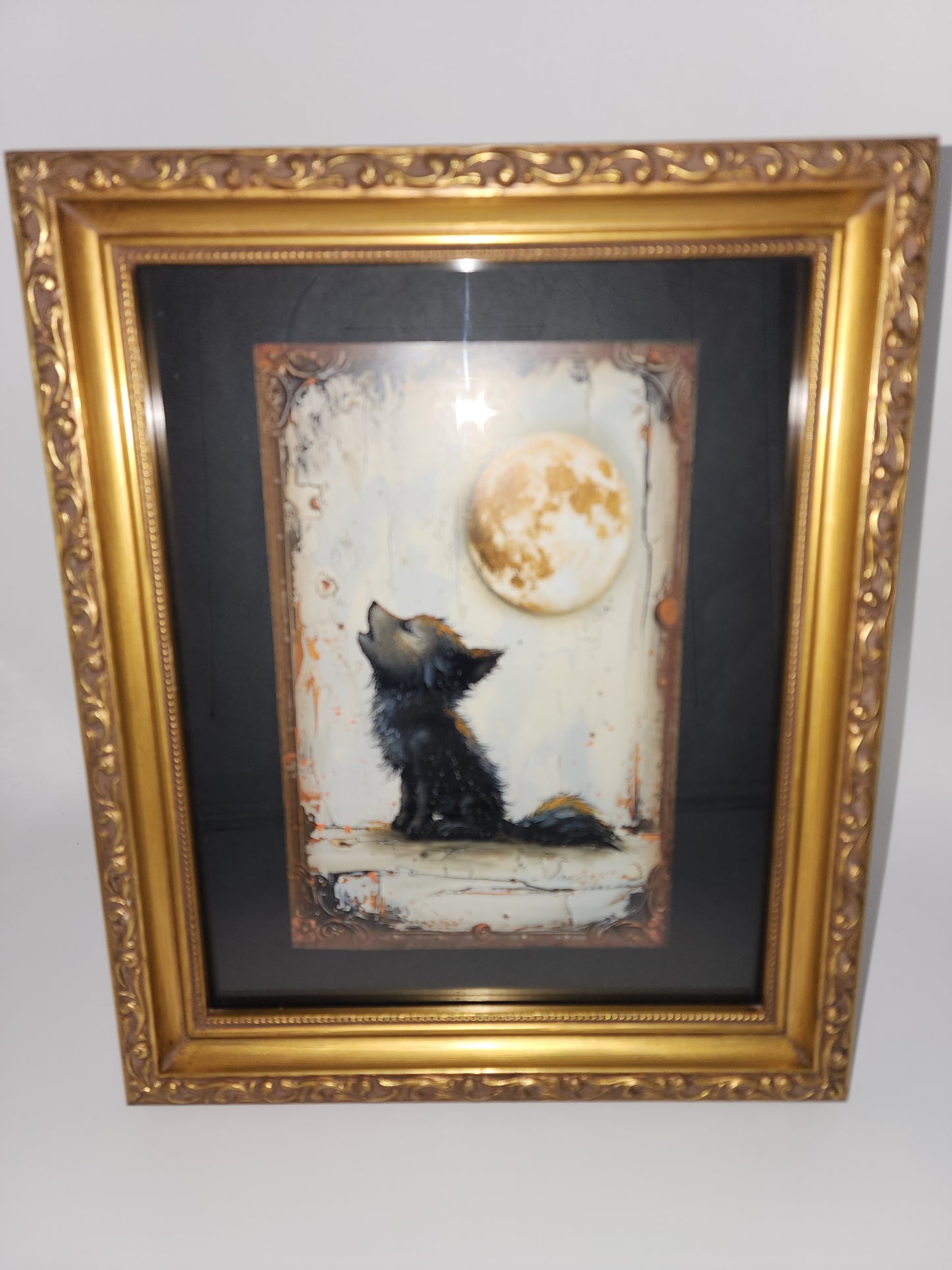 Baby Wolf Howling at the Moon Framed Print